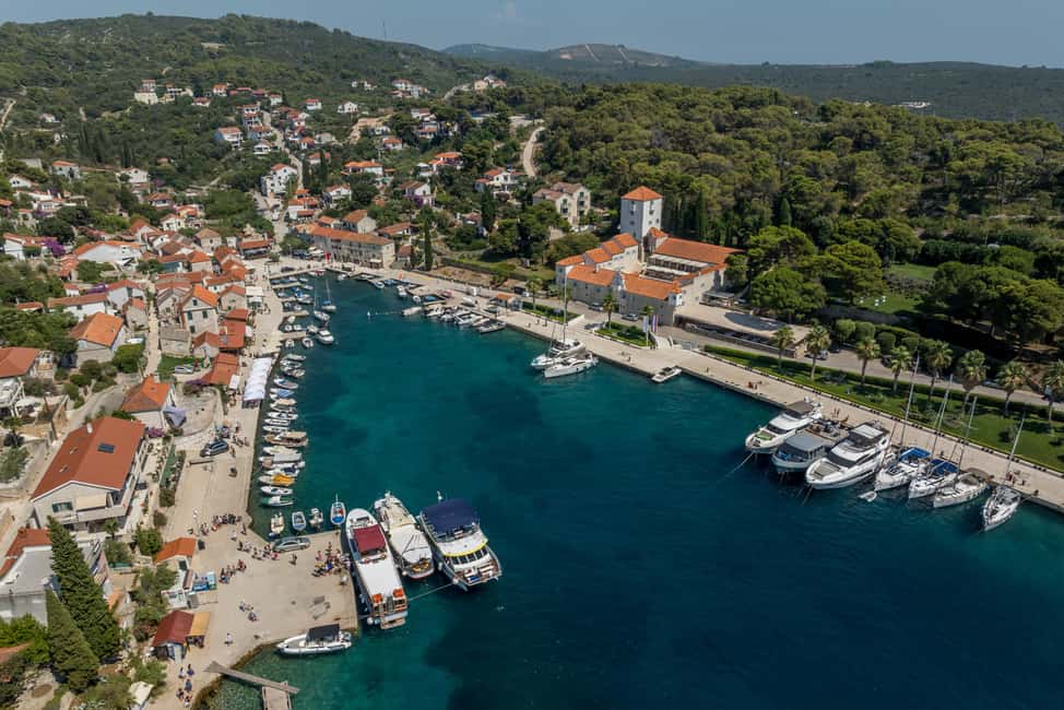 Blue Lagoon & Islands Day Cruise from Split with Lunch - Maslinica on Šolta: village time, beaches, and shipwreck snorkeling