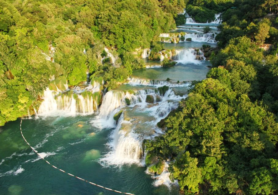 From Split: Krka Waterfalls Cruise & Trogir Walking Tour - Walking UNESCO Trogir: medieval walls, bell towers, and church details