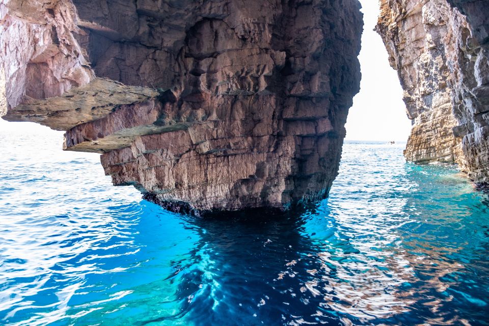 From Split: Luxury Cabin Boat Tour to The Blue Cave and Hvar - Blue Cave: tickets not included, but the inside color is the point