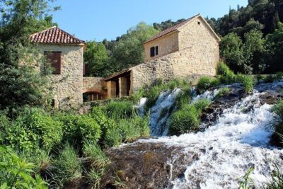 From Split or Trogir: Krka Waterfalls & Primošten Sightseeing - Primošten’s 2-hour free time: beach shoes and a viewpoint habit