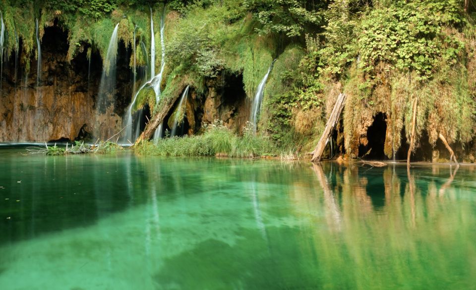 From Split or Trogir: Plitvice Lakes Guided Full-Day Tour - Boat ride on Kozjak Lake: your calmer moment