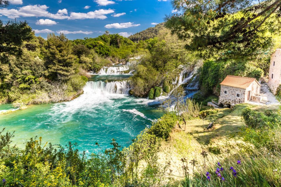 From Split & Trogir: Krka Waterfalls Day Tour with Boat Ride - The riverboat cruise to Skradin: short ride, big views