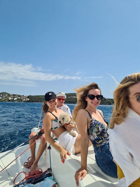 From Trogir Day sailing (private tour) - Onboard vibe: sailing skills plus water, snacks, and SUP time