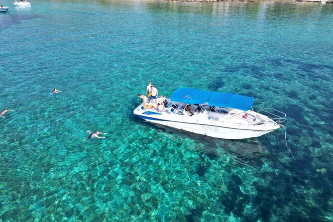 From Trogir & Split: Half Day Speedboat Tour with Blue Lagoon - The onboard vibe: newer boat, music, and a crew that sets the tone