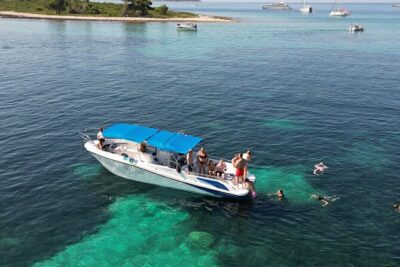 From Trogir & Split: Half Day Speedboat Tour with Blue Lagoon - Stop 1: Blue Lagoon / Krknjasi Bay and the joy of swimming from the boat