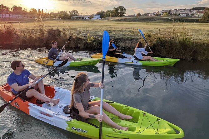 Kayak Sunset Tour In Split - Turning from river to open sea: cliffs, houses, and the best kind of motion