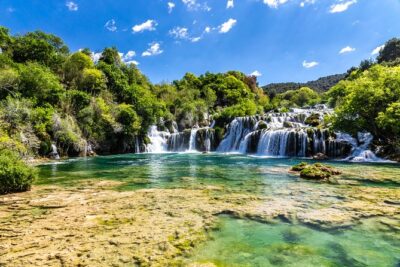 Krka Waterfalls & historic Šibenik - driver&guide, boat cruise, lunch break - Skradinski buk Waterfall Time: The Walks That Make It Feel Real