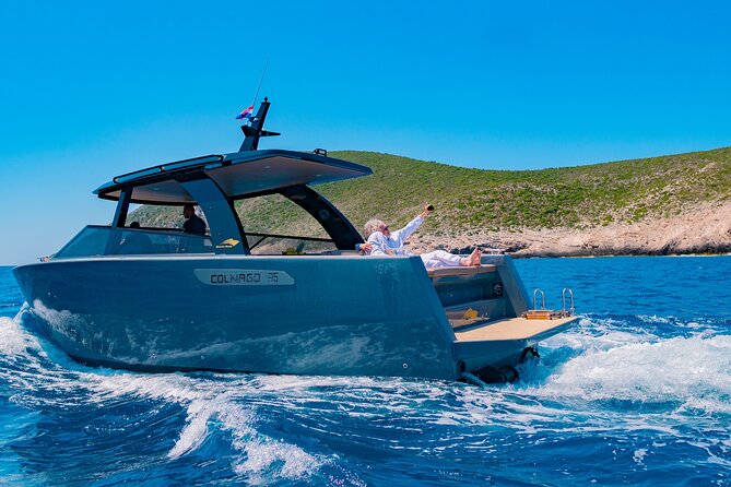 Luxury Blue Cave & Five Islands Tour from Split - Pakleni Islands and Palmižana bay: pine trees, moored boats, and a scenic pause