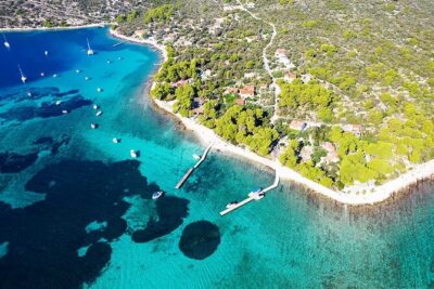 Speedboat Blue Lagoon & 3 Islands tour from Trogir - Stop 1: White Lagoon at Drvenik Mali (Beach Vela Rina)