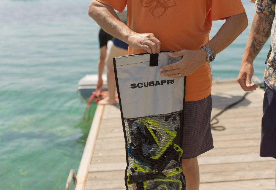 Split: Blue Lagoon & 3 Islands Speedboat Tour - Blue Lagoon: turquoise water, snorkeling gear, and a reality check