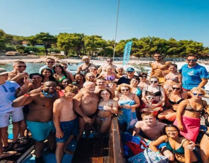 Split: Blue Lagoon Boat Trip with Lunch, Wine and Snorkeling - Lunch, wine, and the party-deck vibe that makes people smile