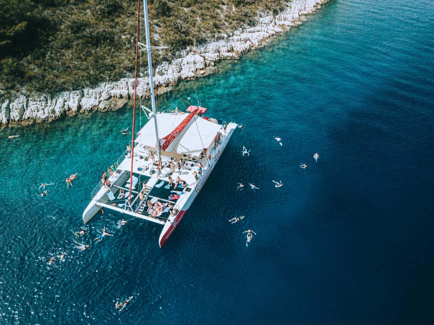 Split: Blue Lagoon & Trogir Boat Tour with Lunch and Drinks - A mega catamaran day from Split, without the stress