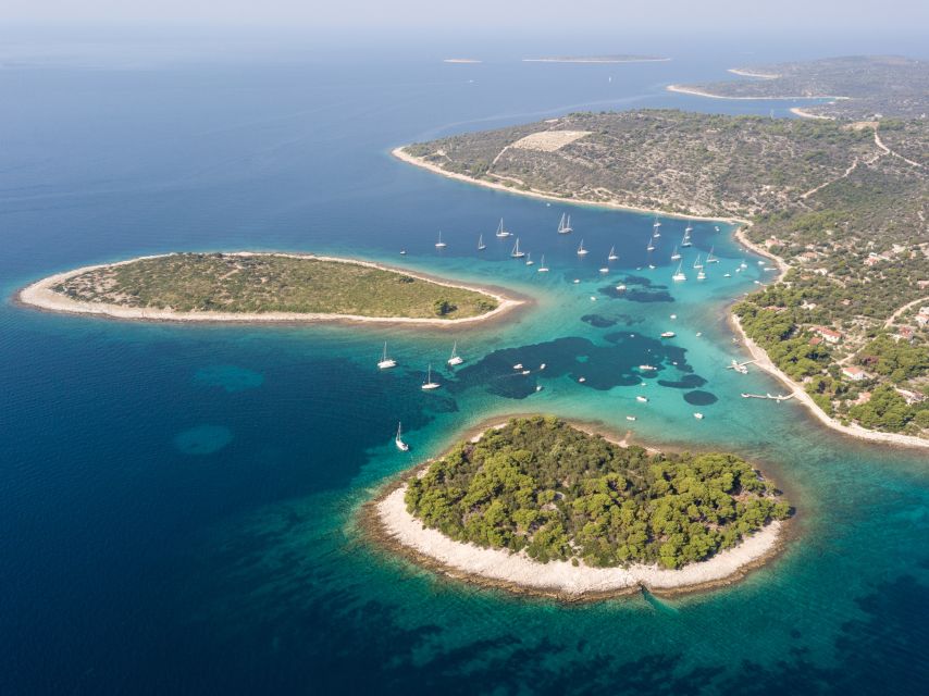 Split: Private Full Day Boat Trip to Blue Lagoon and Trogir - Stomorska Bay: lunch options with taverns and old-meets-new boats