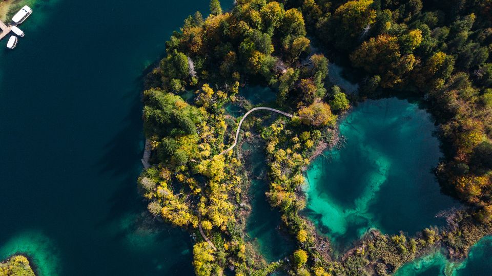 Split: Self-Guided Plitvice Lakes Day Tour with Boat Ride - Boat ride on the lower lakes: falls from the waterline