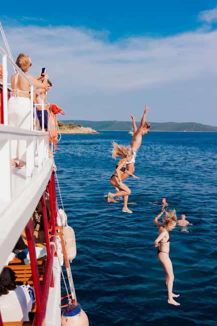 Split: Sunset Boat Party with Live DJs and Blue Lagoon Swim - Blue Lagoon Swim Stop: Goggles, Floaties, and a Built-In Option to Stay Dry